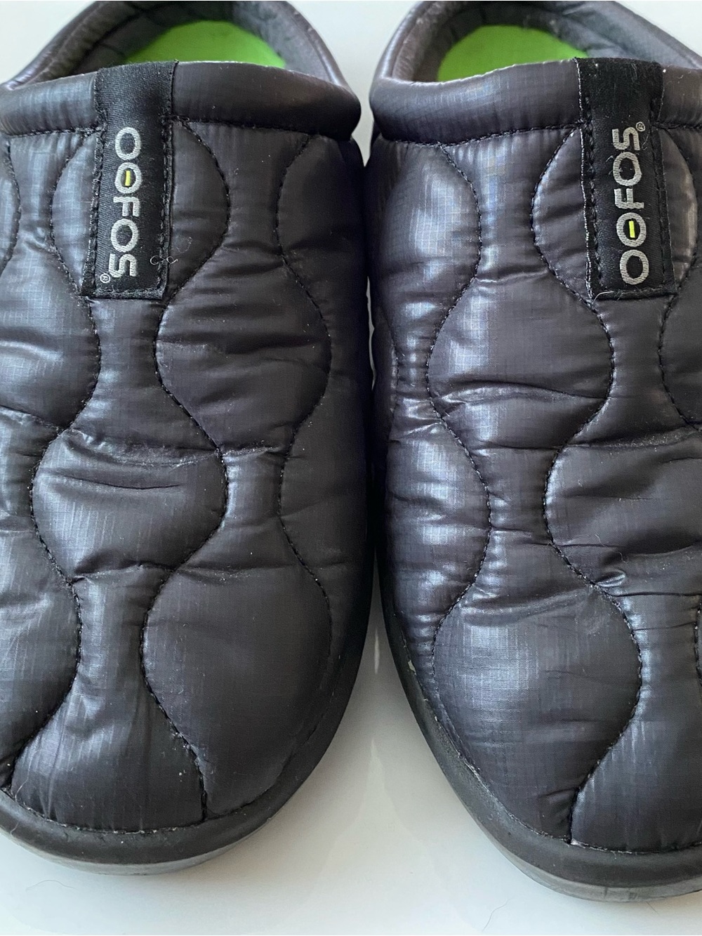 OOFOS Quilted Slip-On Loafers in Black with Green Insole